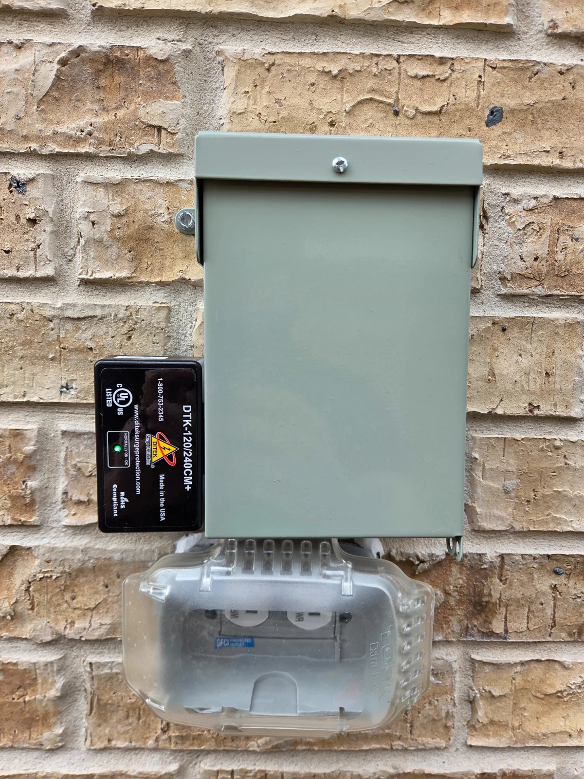 DITEK DTK 120/240CM+ installed beside an equipment disconnect
